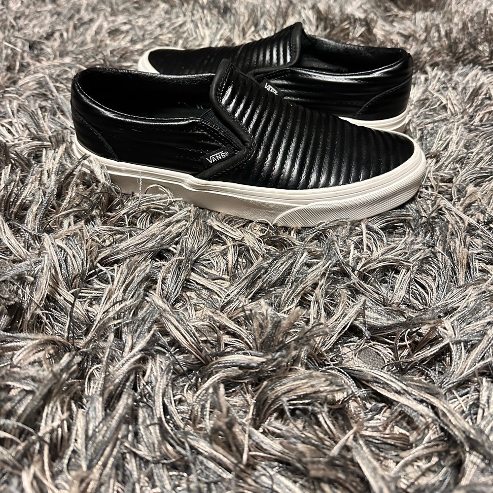 Black leather slip-on Vans